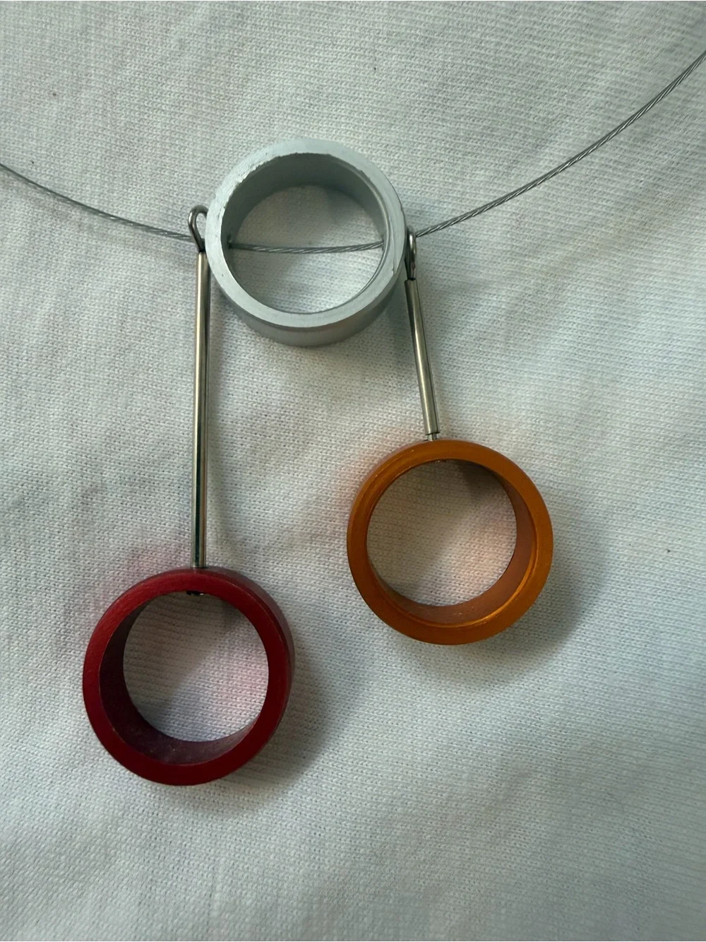 Contemporary Silver Necklace with Yellow and Pink Rings